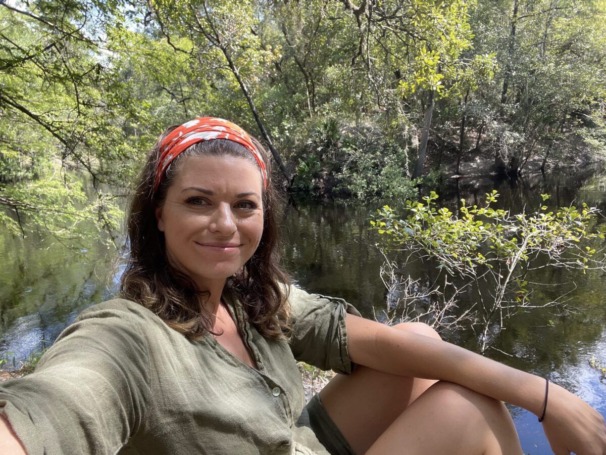 Savannah smiling on the banks of the Sopchoppy River