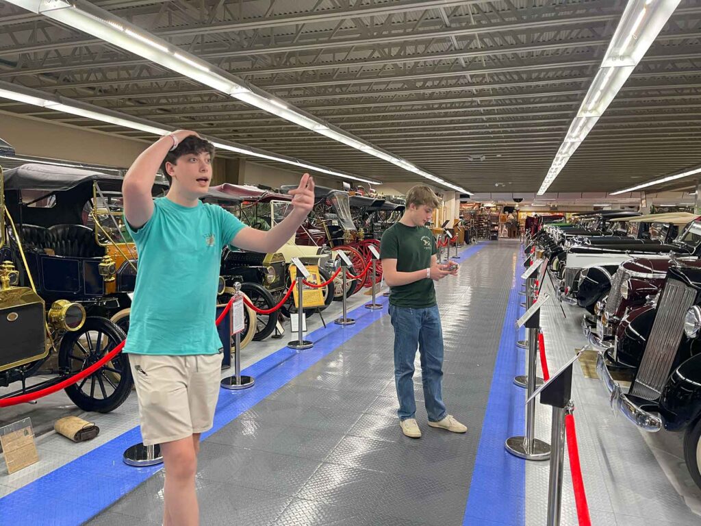 Kids looking at cars at the Tallahassee Car Museum